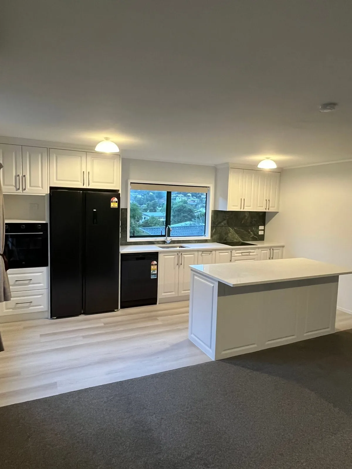Open-plan kitchen and living area renovation in Auckland